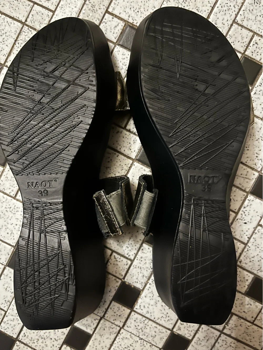 Footwear accessory - sandals/straps visible